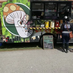 a food truck parked in a parking lot