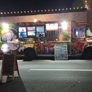 a food truck parked in a parking lot