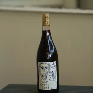 a bottle of wine on a table