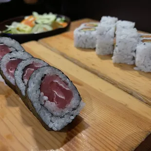 a sushi roll on a cutting board