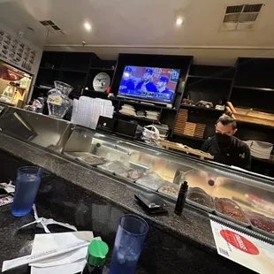 a view of a restaurant from the counter