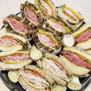 a platter of sandwiches