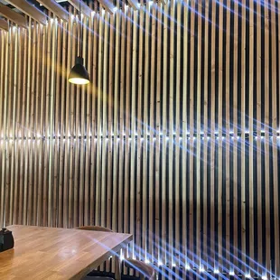 a dining room with a table and chairs