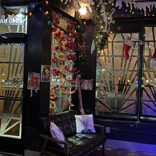  a storefront with christmas decorations