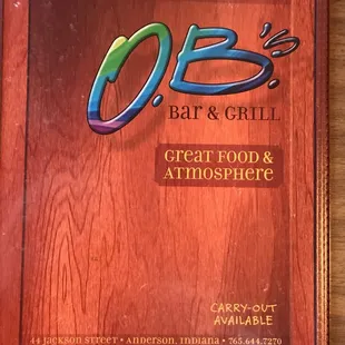 the restaurant&apos;s logo on a plaque