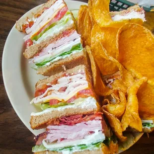 Club sandwich was huge and the homemade chips were great!