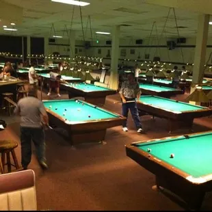 people playing pool