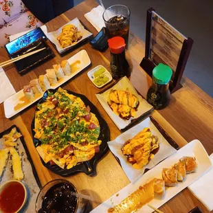 Chanel roll  poki nachos  sammy special jalapeño bomb Who&apos;s your daddy shrimp tempura.