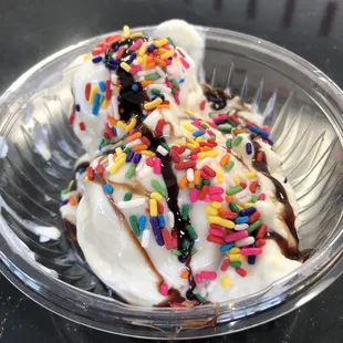 Banana ice cream with chocolate syrup and sprinkles tastes like a banana split