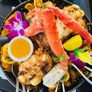 a plate of seafood and rice