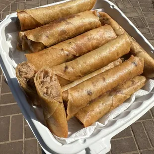 Our famous pulled pork lumpia. Smoked pulled pork wrapped in a lumpia wrapper dipped in our secret barbeque sauce