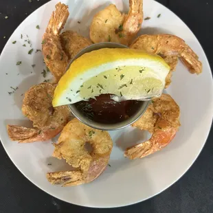 Fried shrimp served with cocktail sauce