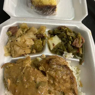 Smother pork chops, fried cabbage, and green beans. Served with cornbread