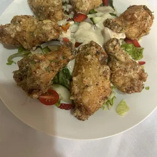 Garlic Parmesan wings served with side salad