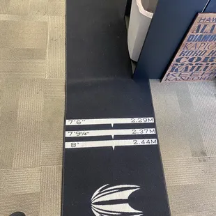 Dart throwing mat