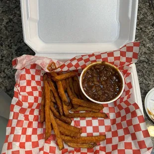 3 meat combo of ribs, brisket, and pulled pork sandwich with sweet potato fries &amp; baked beans $22 (instagram: @issa.cheatday)