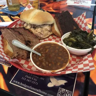 Three Combo Platter with 3 Meats Dinner - ribs, brisket, pulled chicken, baked beans, and collards greens.