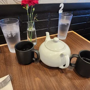 Green Tea with the biggest mugs I&apos;ve seen in a Thai restaurant.