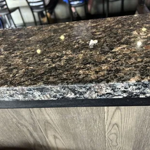 a closeup of a granite counter top