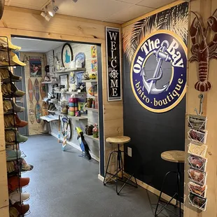 Unique lake, coastal and beach decor and wall signs. Eat, drink and shop all in one boutique