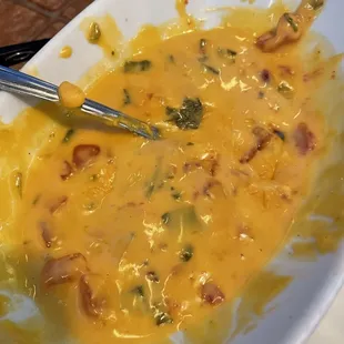 The queso is cheesy, like in a good way