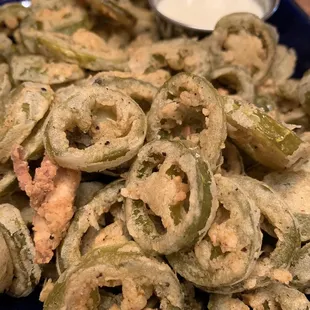 Deep fried pickled jalapeños! Very good. Not hot so pretty safe.