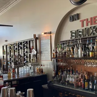 a bar with lots of bottles