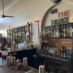 a bar with a lot of bottles