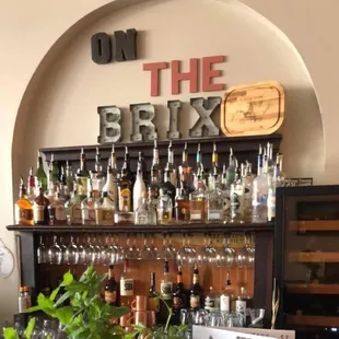 a bar with bottles and glasses