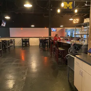 a restaurant with tables and chairs