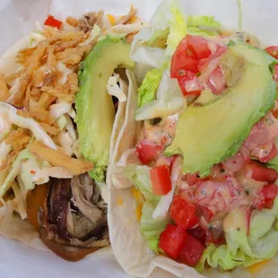 Taco combo - one pulled pork and one chicken taco both with On the Fly (sweet and tangy) sauce