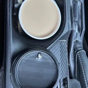 Grossly overfilled cup.  Lukewarm coffee. As you can see, this so-called 'latte' is mostly milk.