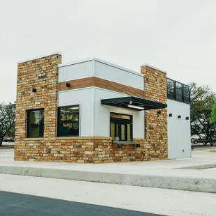 a building with a brick facade