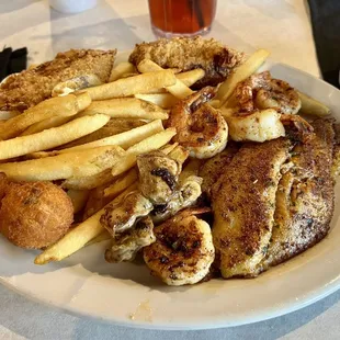 Half Shell Seafood Platter with blackened catfish and shrimp and grilled oysters.