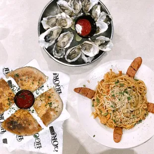 Garlic and Cheese Bread, Live Oysters, and Pastalaya