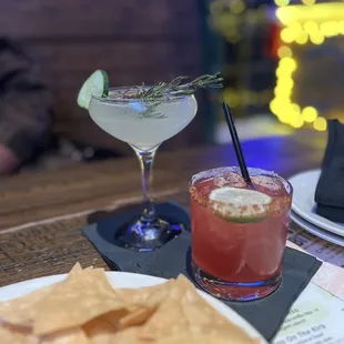 a plate of chips and a drink