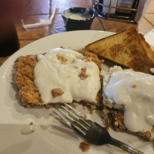 Chicken Fried Steak with mashed potatoes, Texas toast, and Onion Rings