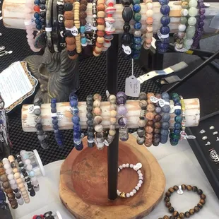 a variety of beaded bracelets