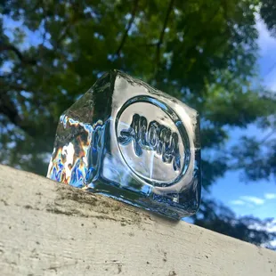 Stamped ice with initials, brand names, or a special date.