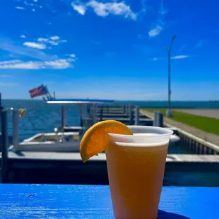 a drink with a slice of orange