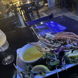 Snow crab legs and a margarita