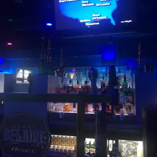 a bar with a large screen