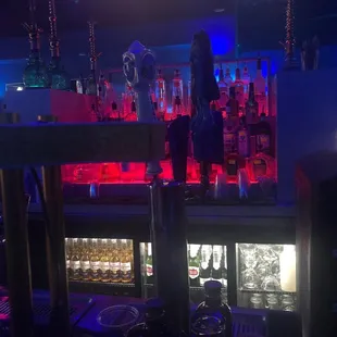 a man standing at a bar