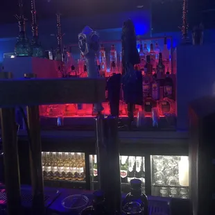 a man standing at a bar
