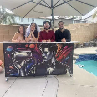 A Bride with the bartenders that made her Bridal Shower an experience to last on too.