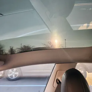 Light coming through the tint on the roof.