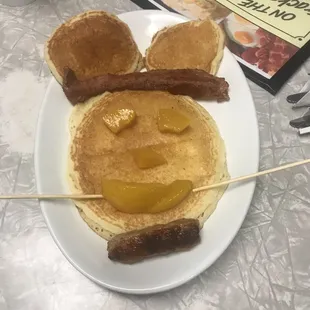 pancakes, sausages, and sausage skewers