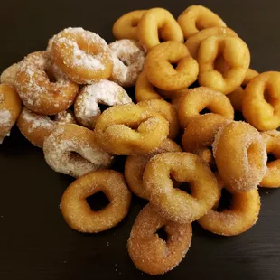 The Classics, cinnamon sugar, powdered sugar, and plain