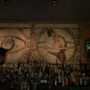 a man standing in front of a bar