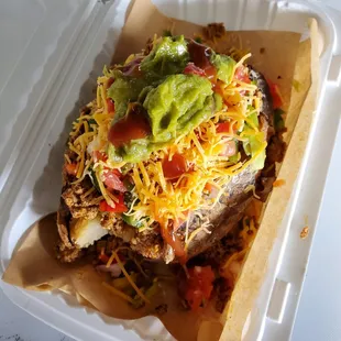 a meal in a styrofoam container